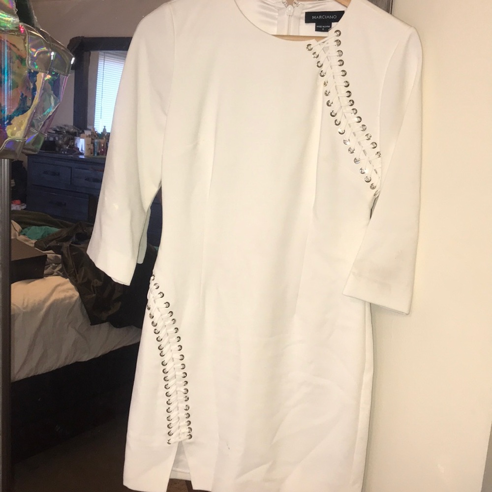 Dress is  too small only worn ONCE on my birthday